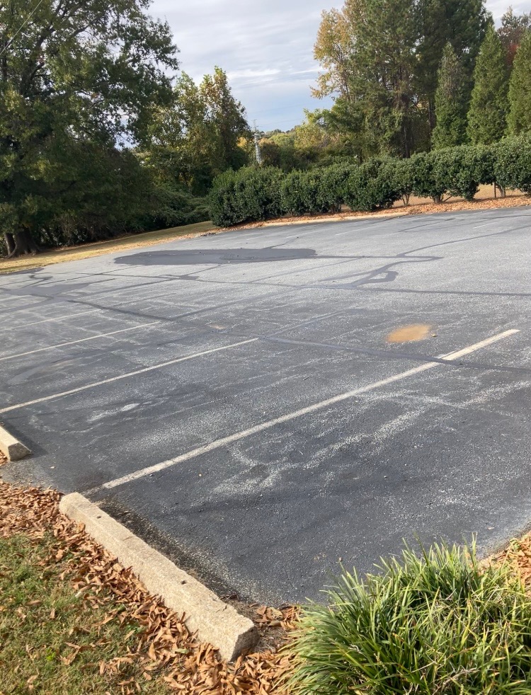 Freshly striped parking lot with clear markings in Greensboro NC